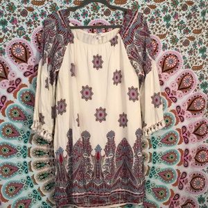 Boutique tunic with bell sleeves and tassels!